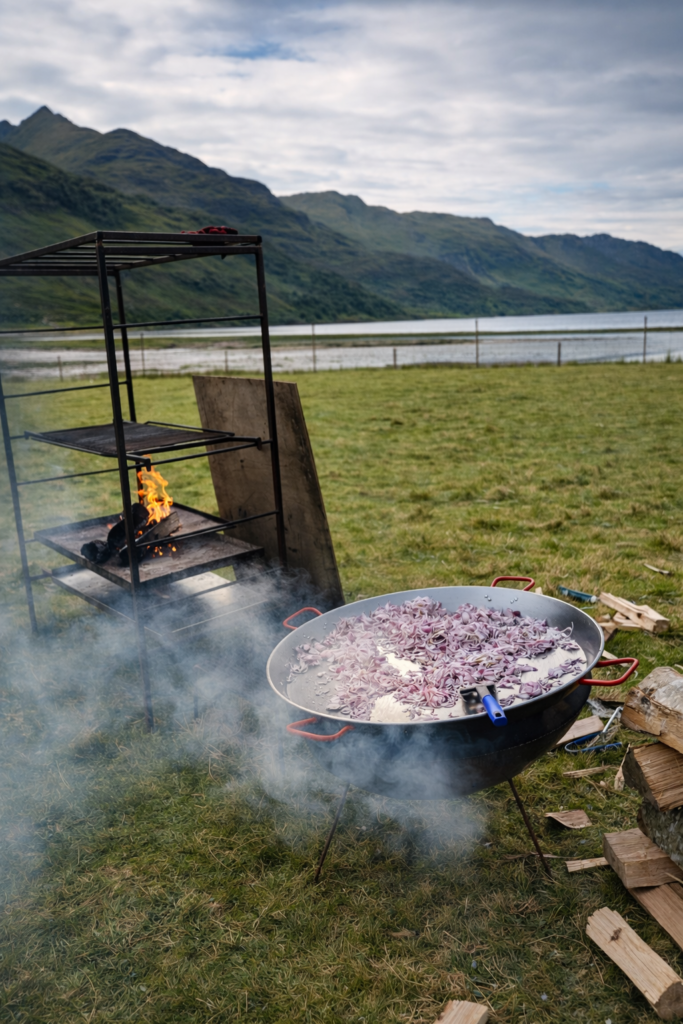 onions cooking on an open fire against a background of mountains